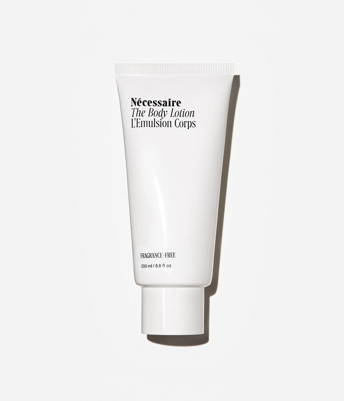 Necessaire The Body Lotion 200ml fragrance-free tube on neutral background